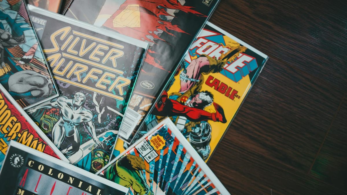 Colourful classic comic books fanned out in a spread — the pop-culture collectibles at the heart of Hong Kong's first official Comic Con